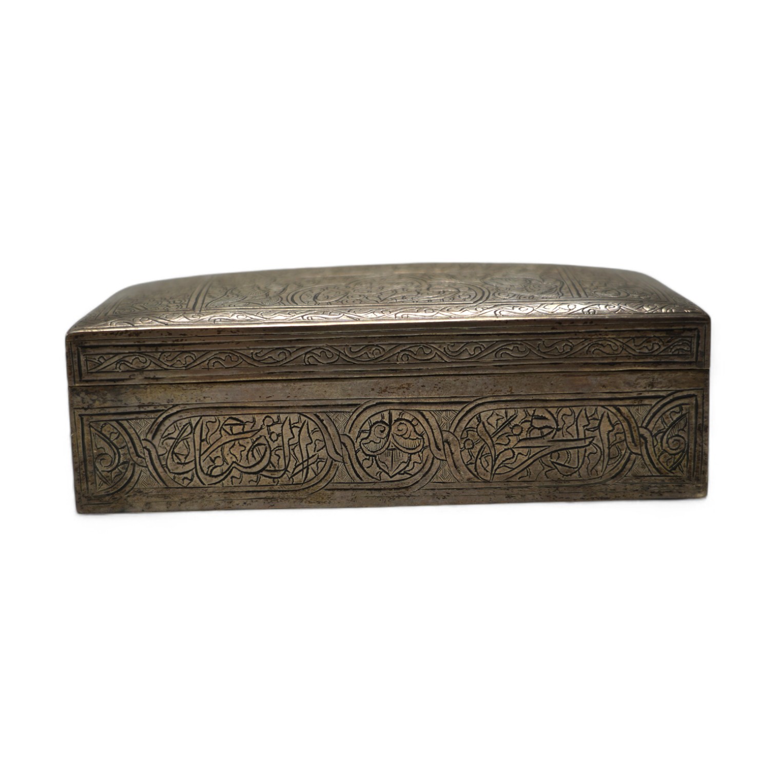 A Middle Eastern engraved white metal rectangular cigarette box, 12.5cm. Condition - fair